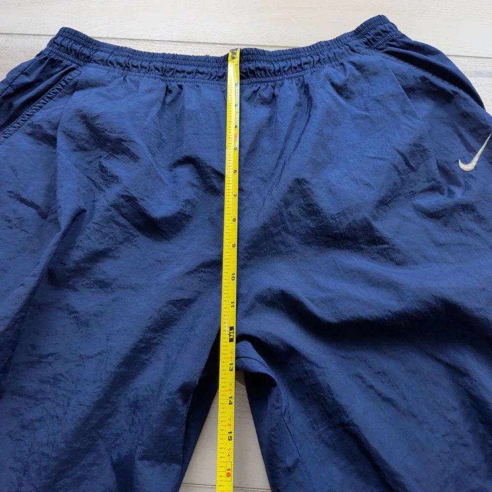 Vintage 90s Nike Men XL Navy Blue Nylon Windbreaker Track Pants Swoosh Ankle Zip